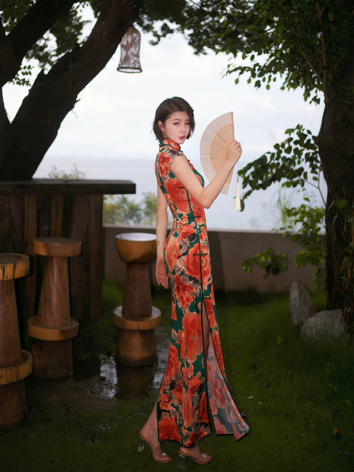 Modern qipao gown with red floral patterns