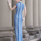 Blue sleeveless full-length qipao gown