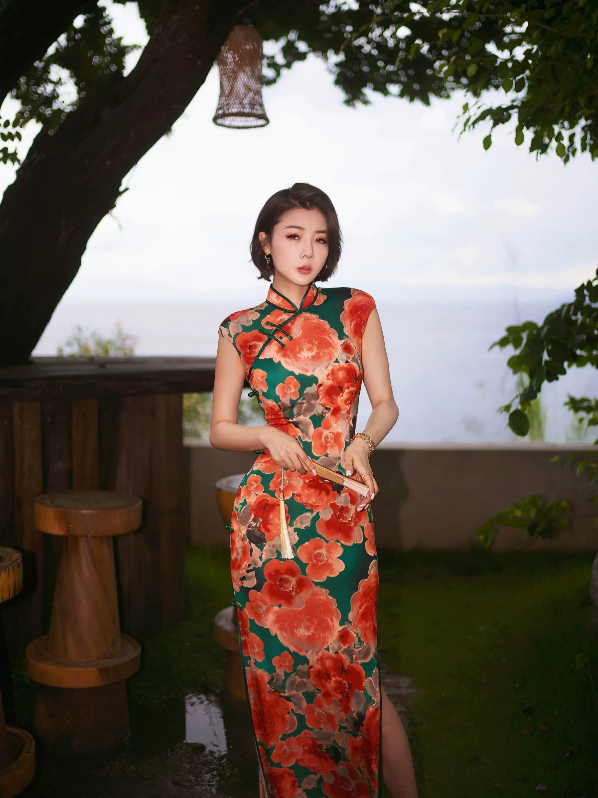 Modern qipao gown with red floral patterns