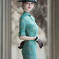 Tailoring a modern blue-green qipao gown for you.