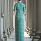 Tailoring a modern blue-green qipao gown for you.