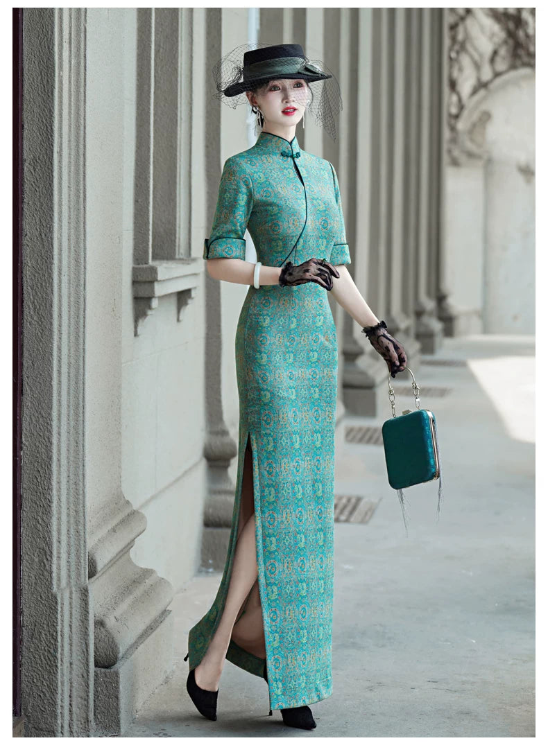 Tailoring a modern blue-green qipao gown for you.