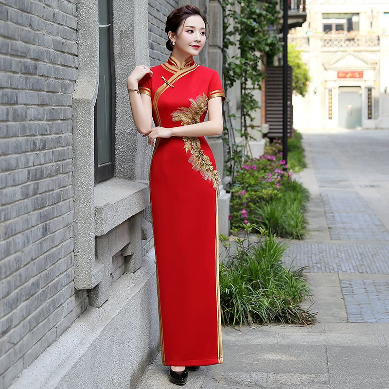 Traditional red qipao gown for the tea ceremony.