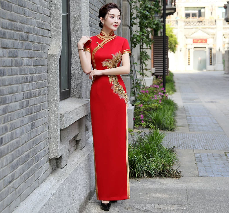 Traditional red qipao gown for the tea ceremony.