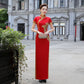Traditional red qipao gown for the tea ceremony.