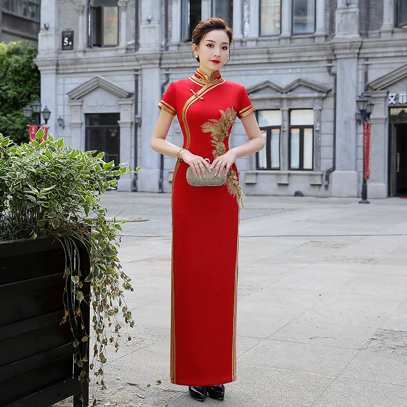 Traditional red qipao gown for the tea ceremony.