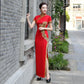 Traditional red qipao gown for the tea ceremony.
