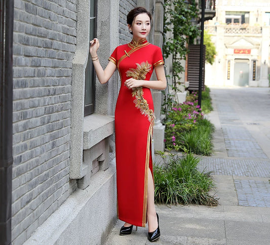 Traditional red qipao gown for the tea ceremony.
