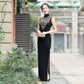 Traditional black sleeveless qipao