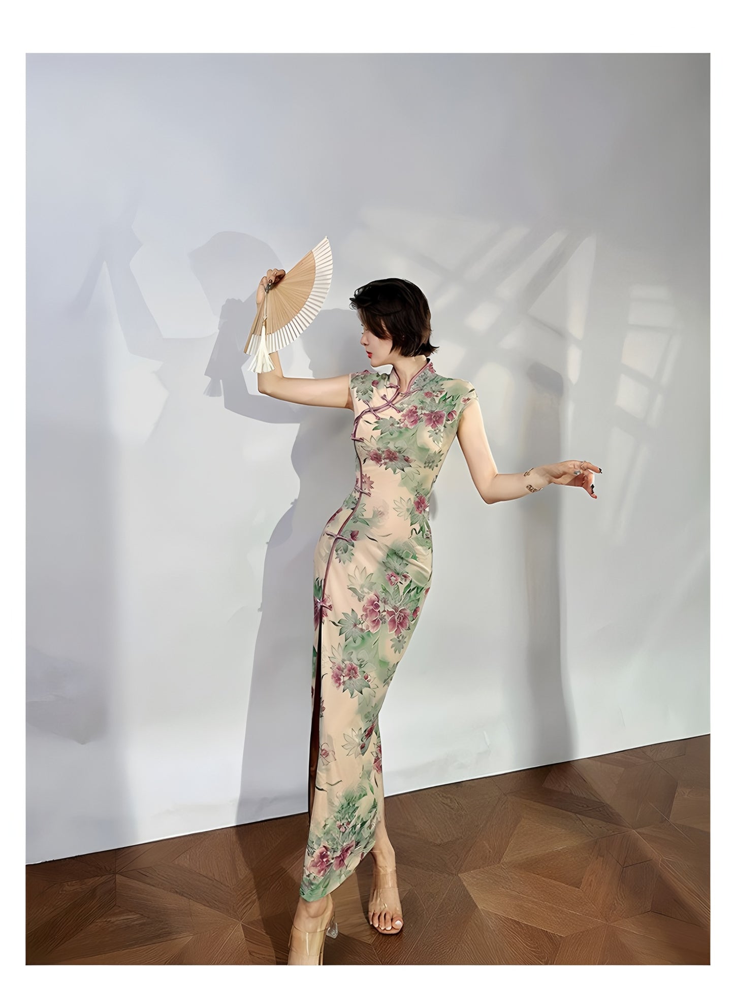 A cyan floral qipao gown for summer.
