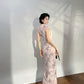 Modern qipao gown with a pink floral pattern