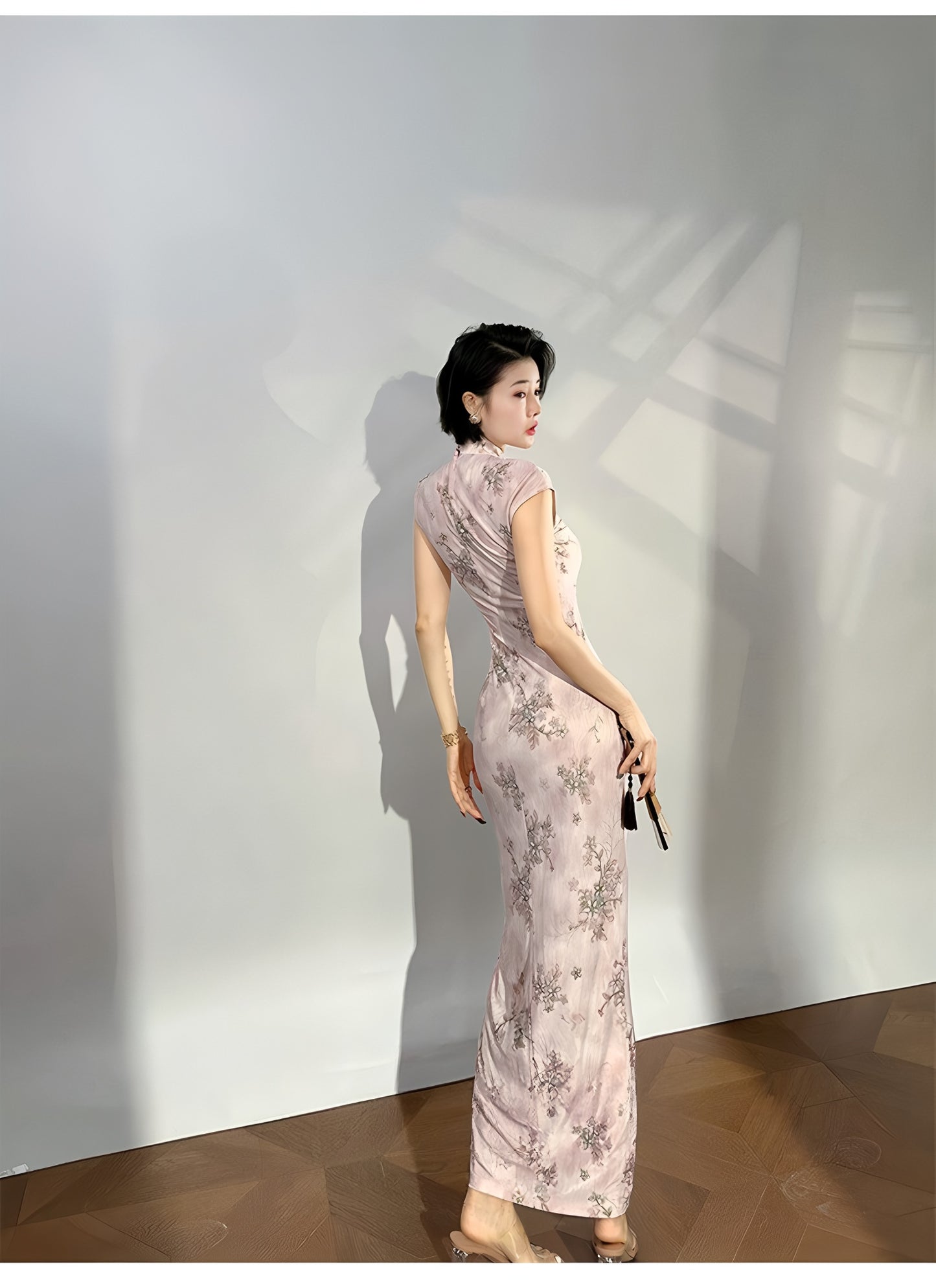 Modern qipao gown with a pink floral pattern