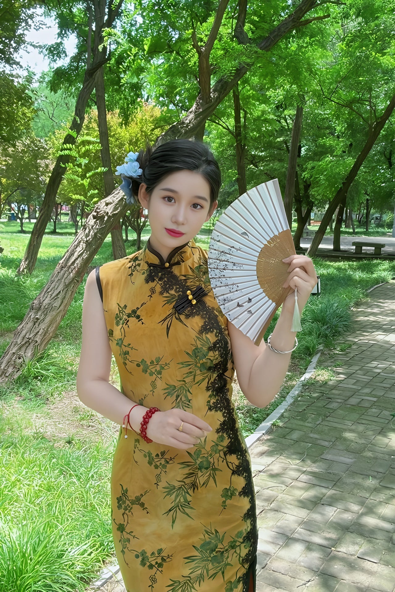 Yellow sleeveless modern qipao with a bamboo print.