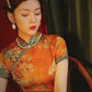 Yellow Chinese short-sleeved cheongsam. Retro cheongsam.