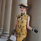 Yellow sleeveless modern qipao with a bamboo print.
