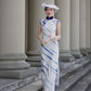 White sleeveless modern qipao gown