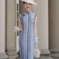 Blue sleeveless full-length qipao gown