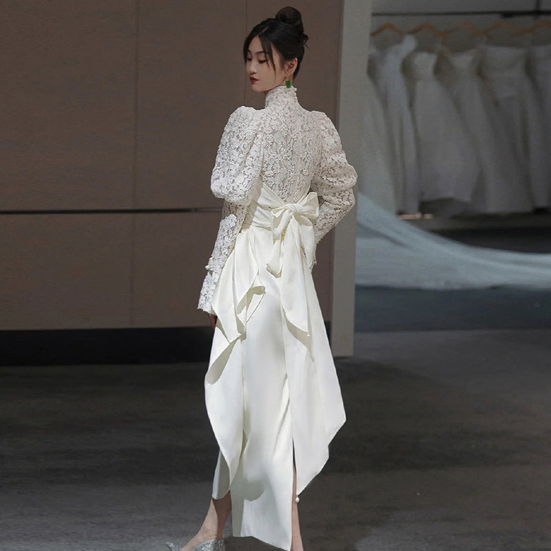 Traditional Chinese white cheongsam wedding dress.