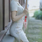 Traditional Chinese cheongsam dress. White cheongsam.